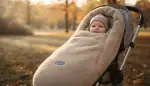 Kuschelig warm und sicher unterwegs: Warum der Merino Teddy Fußsack für Kinderwagen ein Must-have ist